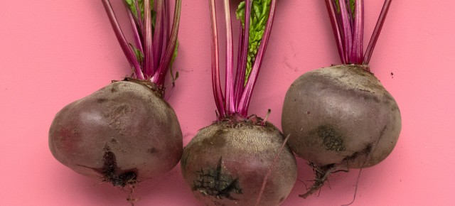 Three beets with stems attached